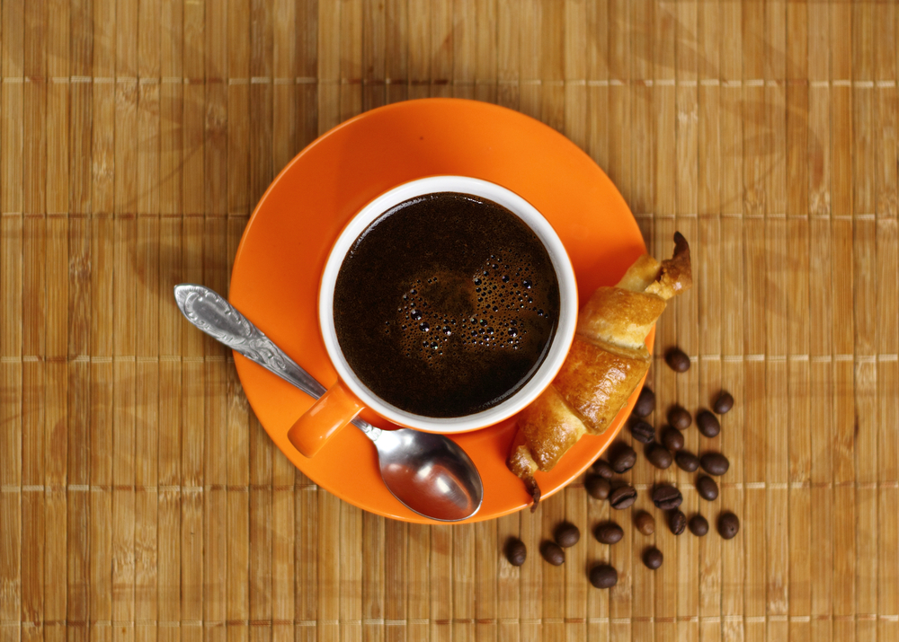 coffee in a cup with beans