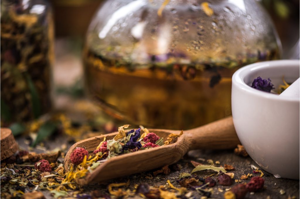herbal tea leaves in a spoon