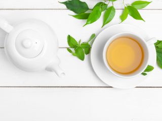 tea pot and cup of white tea