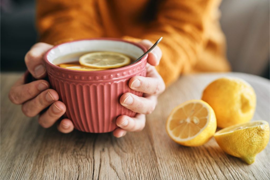 big cup of hot tea with lemon