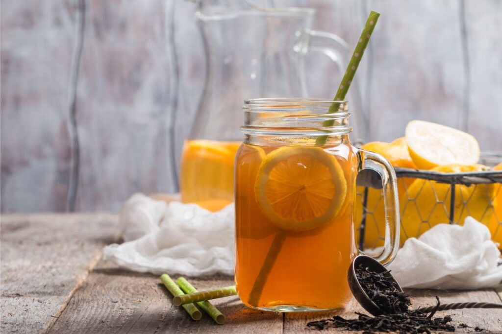 jar of hard iced tea with lemon