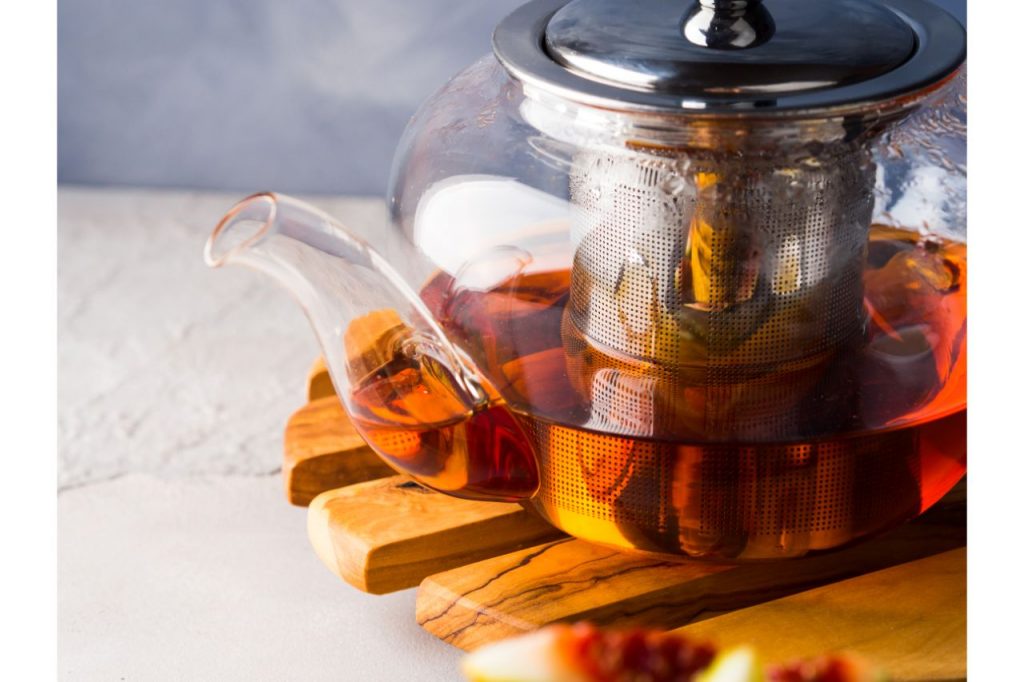 teapot of roobios tea and honey